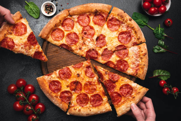how many calories are in a slice of pizza